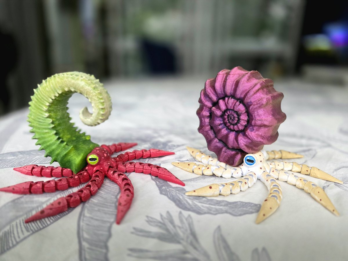 OrionSpacenoise's tweet photo. These two little guys are ready to shine straight from the Devonian, cheese and  guava, ammonites 3d printed and painted
#paleoart #amonite #Devonian #3dprint https://t.co/OIkuiqFD1o