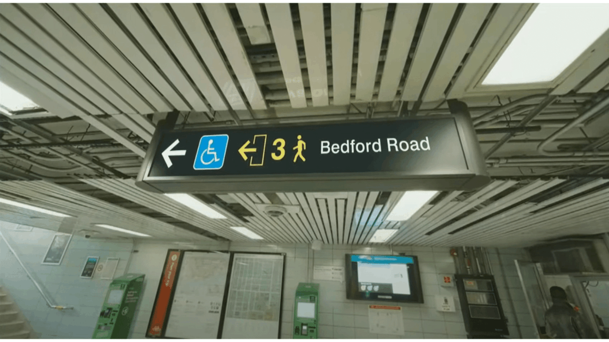 redesigningTTC's tweet image. Numbered exits are proposed, although presentation is suboptimal. Signs are too reliant on presenting all possible information at once and are filled with icons.

Exits now introduce three separate icons: a yellow door, number, and pedestrian. Compared to MX simpler approach.