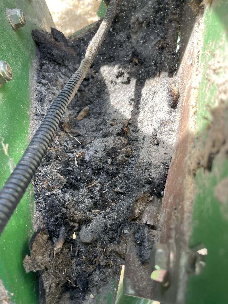 Straw chopper bearing went out, after replacing it, I found that burnt chaff had collected behind the tail light in the engine compartment. Could have been bad.