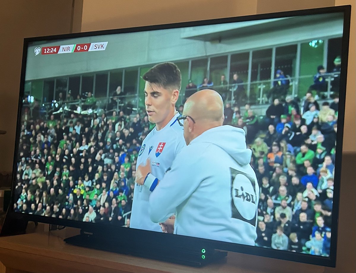 RealJamesCooper's tweet image. Slovakia manager has turned up in a hoodie! It’s only a lidl one though… #Lidl