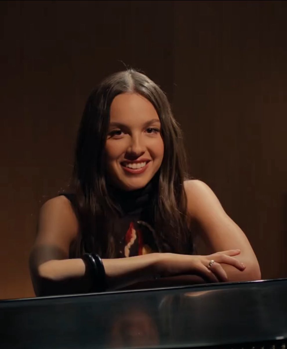 PopCrave's tweet image. Olivia Rodrigo reveals to AMEX that she’s back in the studio working on her third album.