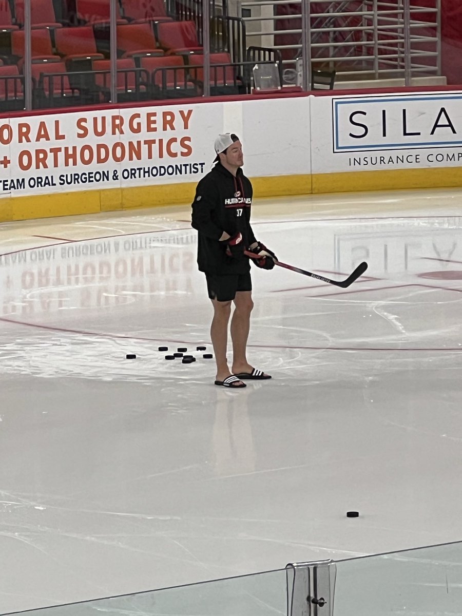 Andrei Svechnikov out taking one-timers... in flip-flops.

Hockey player