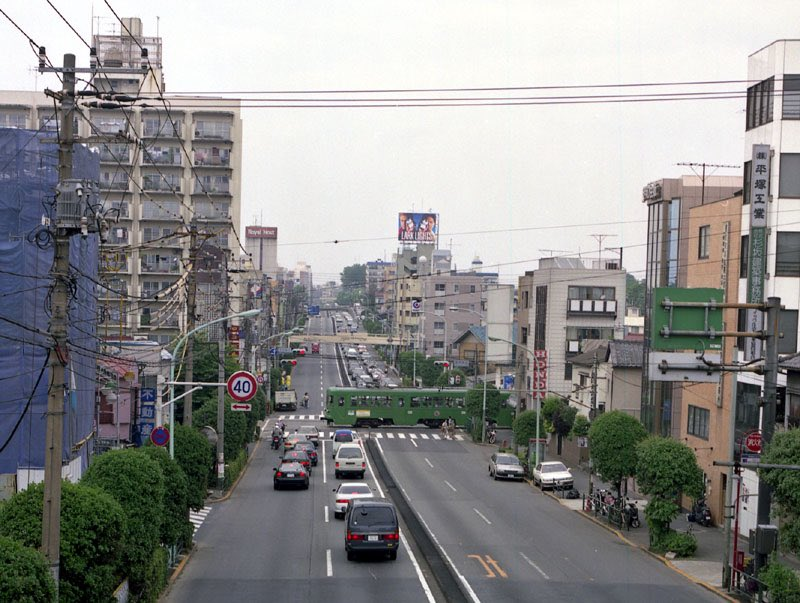 jaapn80to00pn's tweet photo. 1992年、世田谷区若林の環七（東急世田谷線「若林踏切」） https://t.co/o7hflq7wM4
