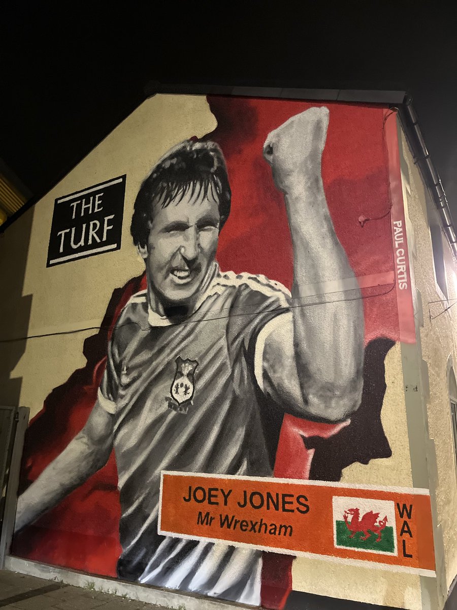 This is amazing - brilliant piece of art for Joey - Mr Wrexham - surely an inspiration for every home game for the Town - UTST 🏴󠁧󠁢󠁷󠁬󠁳󠁿⚽️🏴󠁧󠁢󠁷󠁬󠁳󠁿 <a href="/welshy1000/">Wayne Jones</a> <a href="/therealMickeyT/">Mickey 🏴󠁧󠁢󠁷󠁬󠁳󠁿</a> <a href="/fearlessidzine/">Fearless In Devotion | WREXHAM AFC podcast</a> <a href="/Wrexham_AFC/">Wrexham AFC</a> <a href="/VancityReynolds/">Ryan Reynolds</a> <a href="/RMcElhenney/">Rob Mac</a> <a href="/robbowxm/">Neil Roberts</a> <a href="/DeclanSwans/">Declan Swans</a>