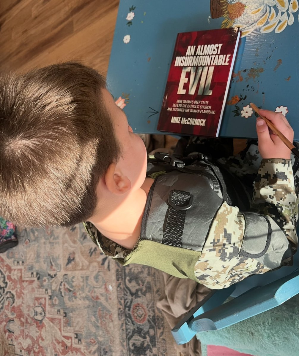 My boy, doing some light, lunch reading. <a href="/JoeUnauthorized/">Mike McCormick, author, Substacker, Biden truther</a>