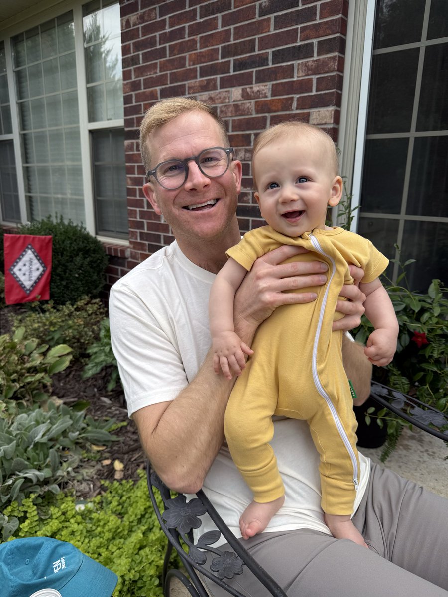 BREAKING: Childless homo struggles to properly hold eight-month-old baby