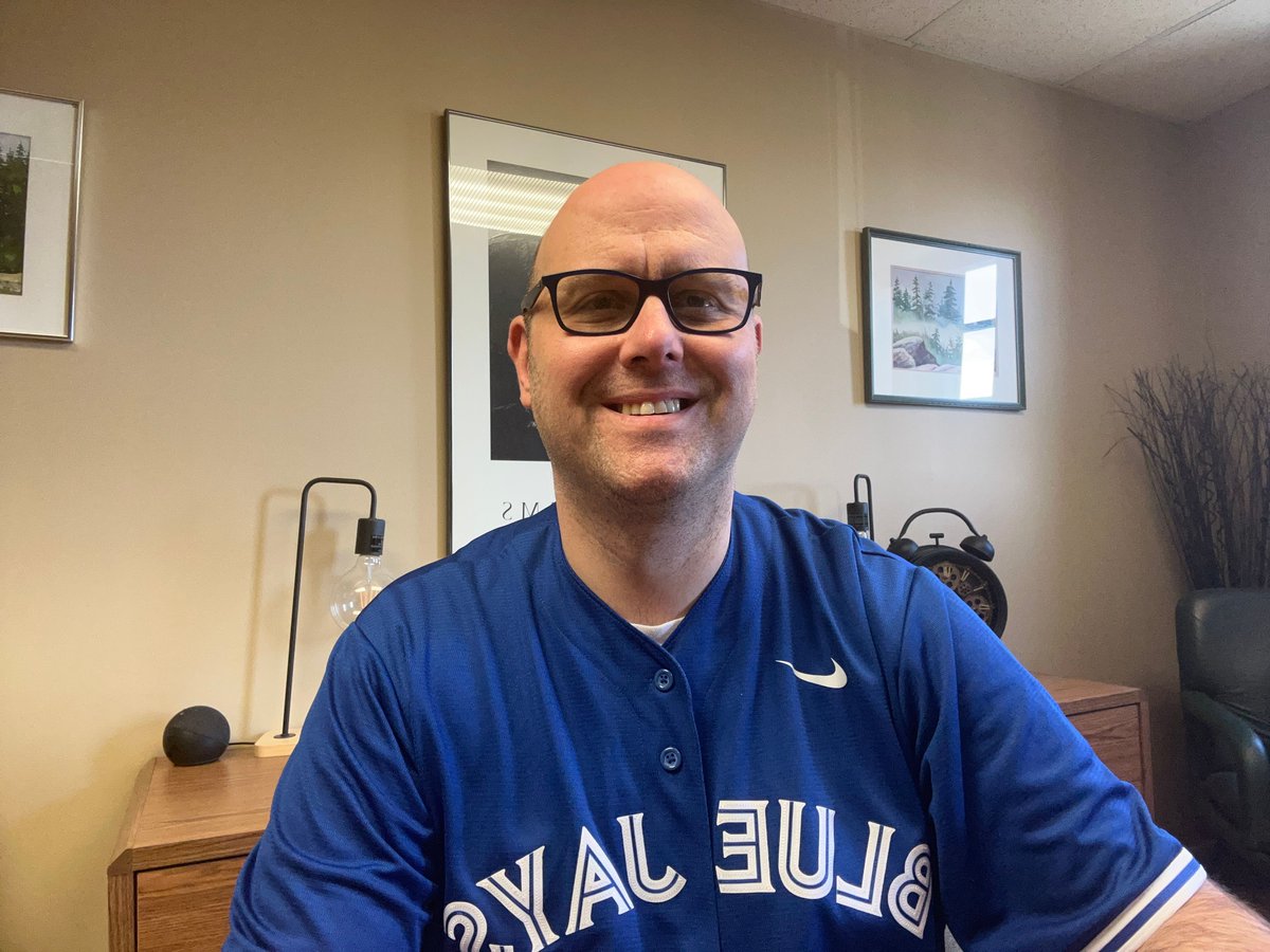 PurvisCulbert's tweet image. I asked my wife whether it was ‘unprofessional’ or ‘fun’ to wear my Jays jersey to work yesterday. ‘Fun’ won out! Go Jays go!