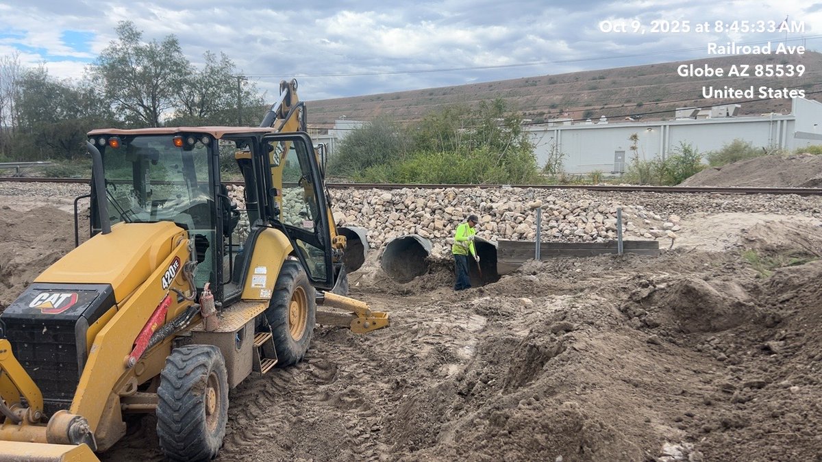 CorpCommAZ's tweet photo. The ACC Railroad Safety Division answered the call for help in Miami: Several culverts under a railroad track were still clogged after last month's deadly flooding. An ACC crew was onsite, &amp; helped clear out the culverts, to prevent future flooding at Miami Jr. Sr. High School https://t.co/pmz5kIaG2L