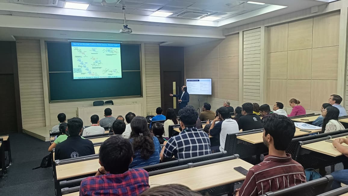 Chemistry_IITB's tweet photo. Prof. @Suvarn_Kulkarni at @GSC_2025  delivered a talk on “Are there sugars in bacteria? What can we do with them?” — unveiling how the sugars can become vulnerable targets in pathogen detection &amp; vaccine design. #Glycochemistry @JOC_OL @iitbombay @ruchianand1975 @anidchemiitb https://t.co/trUhdm2eLZ