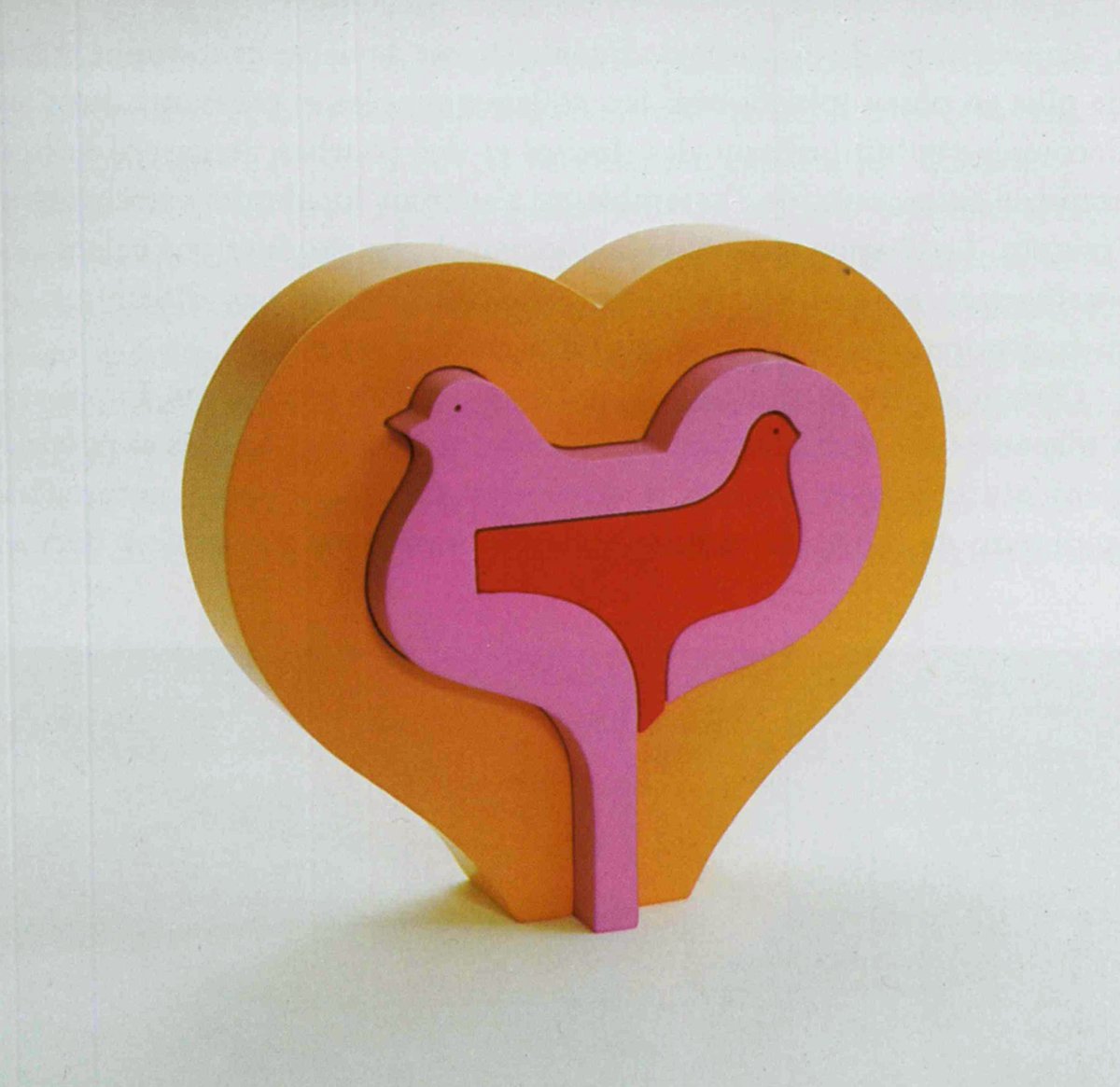 DesignReviewed's tweet image. Examples of Zenji Funabashi&apos;s flat three-dimensional works in wood, in which the various coloured elements fit together. These are entitled Man and Moon, Kissing Couple, Birds in a Heart and Man and Heart.  Scanned from Graphis 226, 1983. designreviewed.com/artefacts/grap…