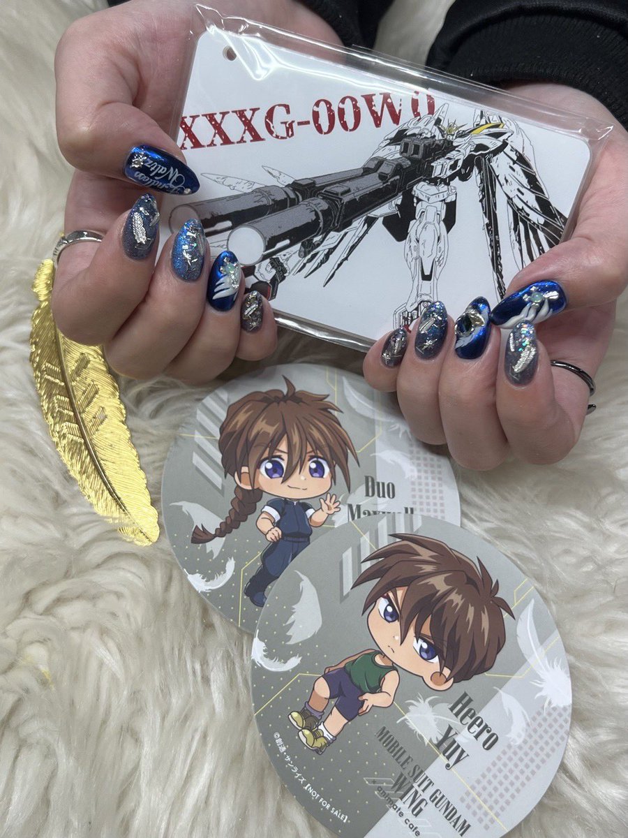 NOUKIN_7's tweet photo. やっと写真送ってもらったので……前回の！
ガンダムW30周年記念に、ウイングガンダムネイル！🪽🫧
これで映画いきました🎥✨ https://t.co/qZRSKEFyAw