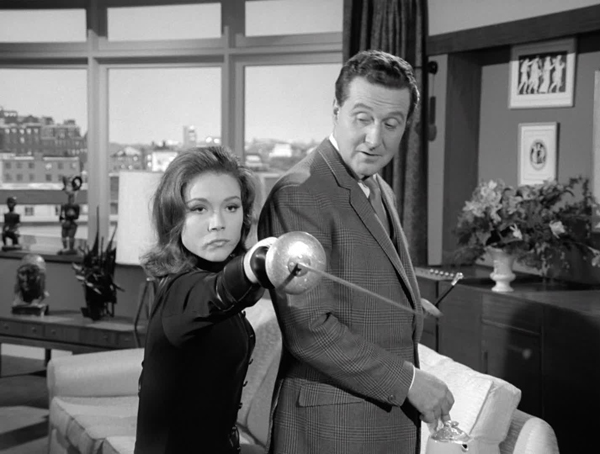 Sixty years ago this week the British TV public was introduced to Emma Peel. John Steed arrives at his new partner's apartment to be greeted by a traditional doorbell, a surreal cyclops eye, a woman in a mask, and then the literal and verbal fencing commenced...