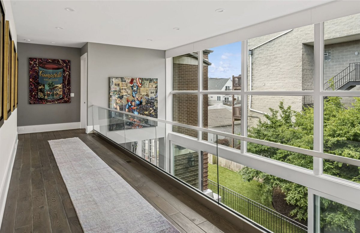 A rare triple-lot estate in Lakeview offering over 8,800 sq ft of luxury living. Highlights include a chef’s kitchen with 15-foot glass doors, serene bedroom suites, a private movie theater, and more. See more: bit.ly/4nLbaa8

Listed by Justin Lucas with <a href="/properties/">@properties</a>