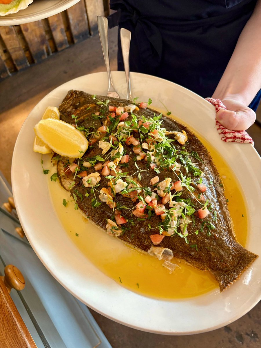 Beautiful whole Brixham brill for two, with tomato, lemon &amp; cockle dressing back on the menu today! 🎣💫

#brill #fishandchips #thescallopshell