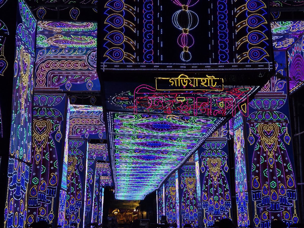 Aah....this festival.
This city and its madness. The sound of dhak...the cacaphony of crowd, the smell of dhuno.

Wished to be born again here in my city in the next birth (if there is one).

I just wish to stand here and hope time stops moving forward.