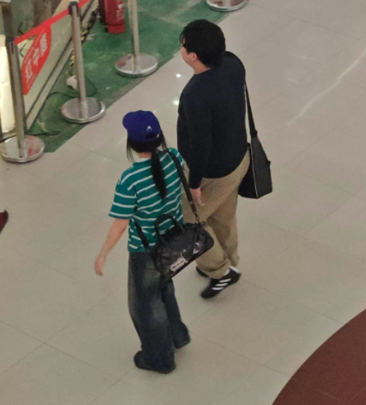 People dressed as Bang Sihyuk and Min Heejin for Halloween in China, one year ago today.