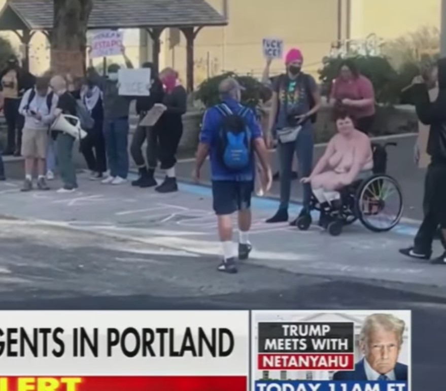 Did <a href="/FoxNews/">Fox News</a> mean to show a nude woman? And to paraphrase Austin Powers 'who brings a nude woman in a wheelchair to an <a href="/ICEgov/">U.S. Immigration and Customs Enforcement</a> protest'?