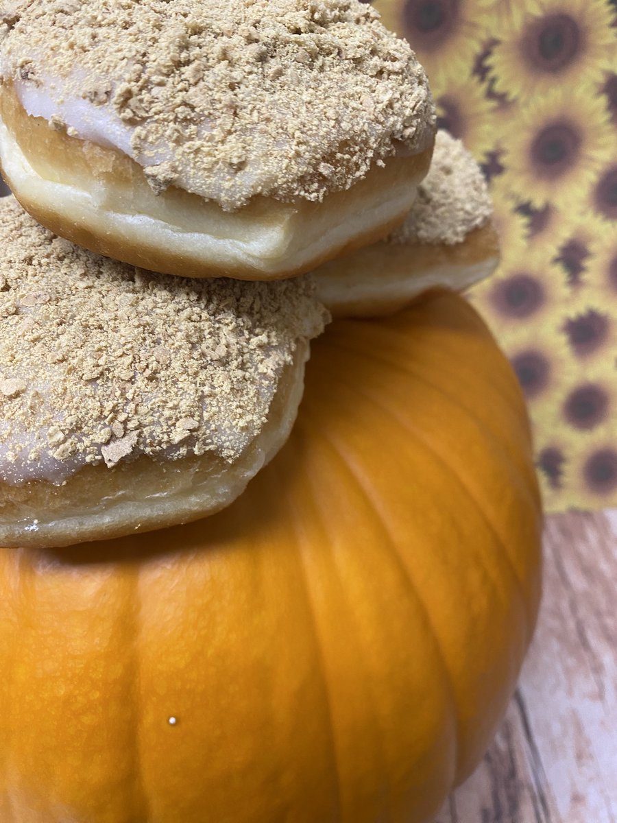 Oh the great pumpkin patch...it calls to all pumpkin lovers!! 
Proudly presenting October's donut: pumpkin pie.  Inside this beauty is pumpkin and whippee. Perched on top is vanilla fondant and graham crackers.  #donutmillreddeer #donutofthemonth