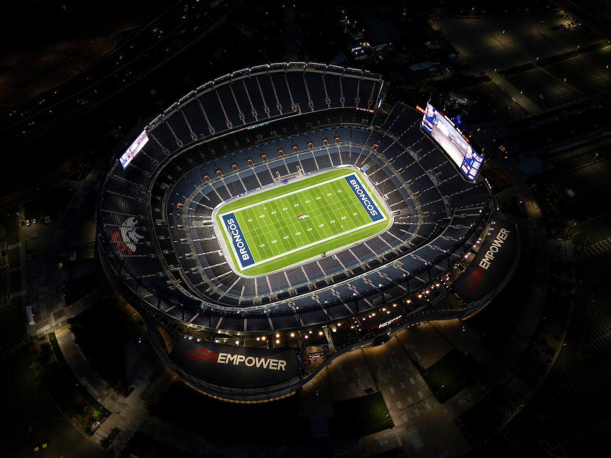 ZacStevensDNVR's tweet photo. This is cool:

Empower Field at Mile High will look a little different on TV tonight in primetime.

This summer 60 new light fixtures (15 per roof) were added to the roofs above the ramps at Empower Field to illuminate the entire building for primetime games.

The lights cover 50,000 square feet of surface.

Mile High is going to be shining bright on Monday Night Football 🏈 🤩