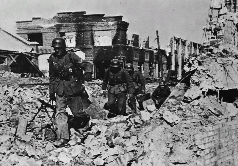 29 September 1942

The air smells of coal and burnt brick. Rows of low houses stand shattered, their walls pocked with bullet holes, roofs torn open like rotten teeth. Civilians once lived here — I saw children’s toys scattered among the rubble, a cracked teapot, a photograph