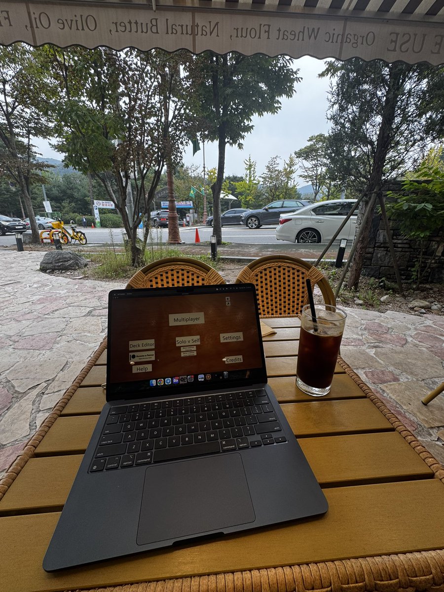 Playing optcg sim in an outdoor cafe in Korea

This is peak af