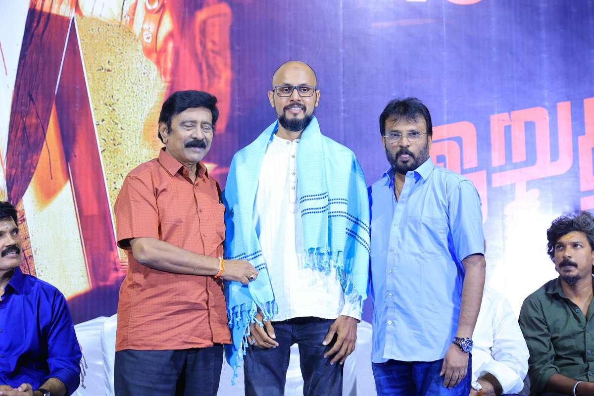 MashookRahman's tweet image. At the audio launch of my next movie #iruthimuyarchi , felicitated by the veteran directors R V Udaya Kumar Sir and Perarasu Sir.