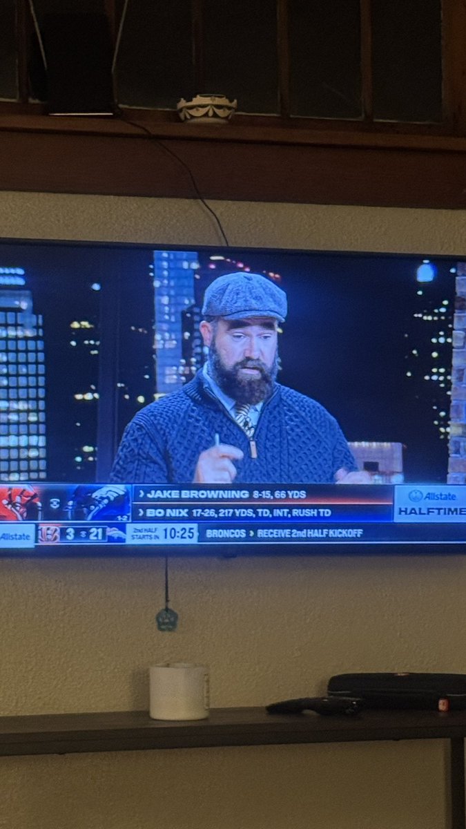 Jason Kelce looks like he’s going to give you his thoughts about the IPA selection at a Denver brewery in RiNo.