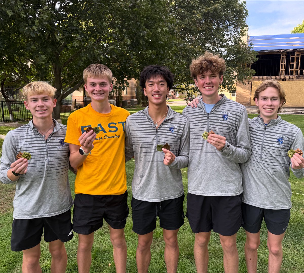 Boys medalists from left to right: Daren Linscott 13th, Ben Schlegelmilch 3rd, Chanh Tran 19th, Joshua Schulte 7th and Dylan Linscott 14th.