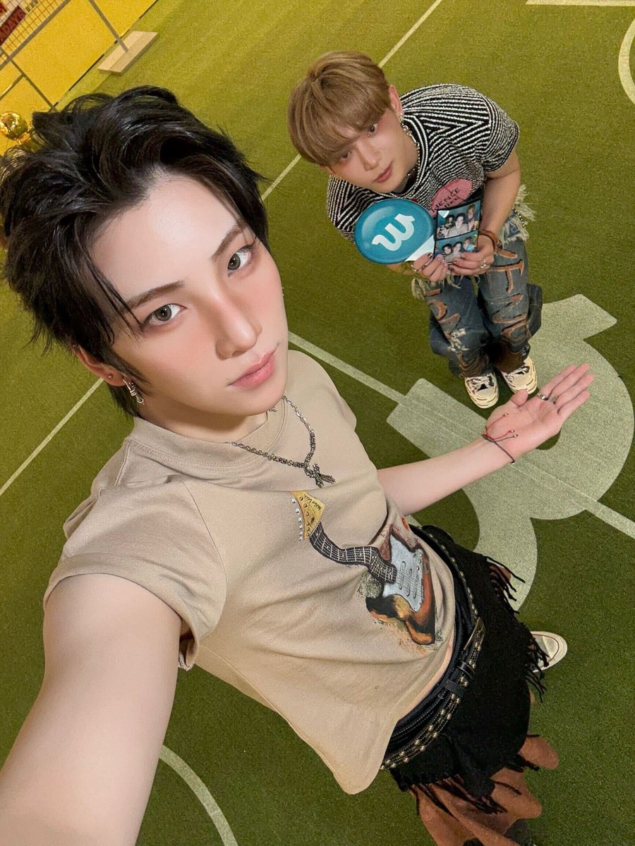 me serving rockstar energy up front while harua looks like he’s about to auction off rare treasures behind me.