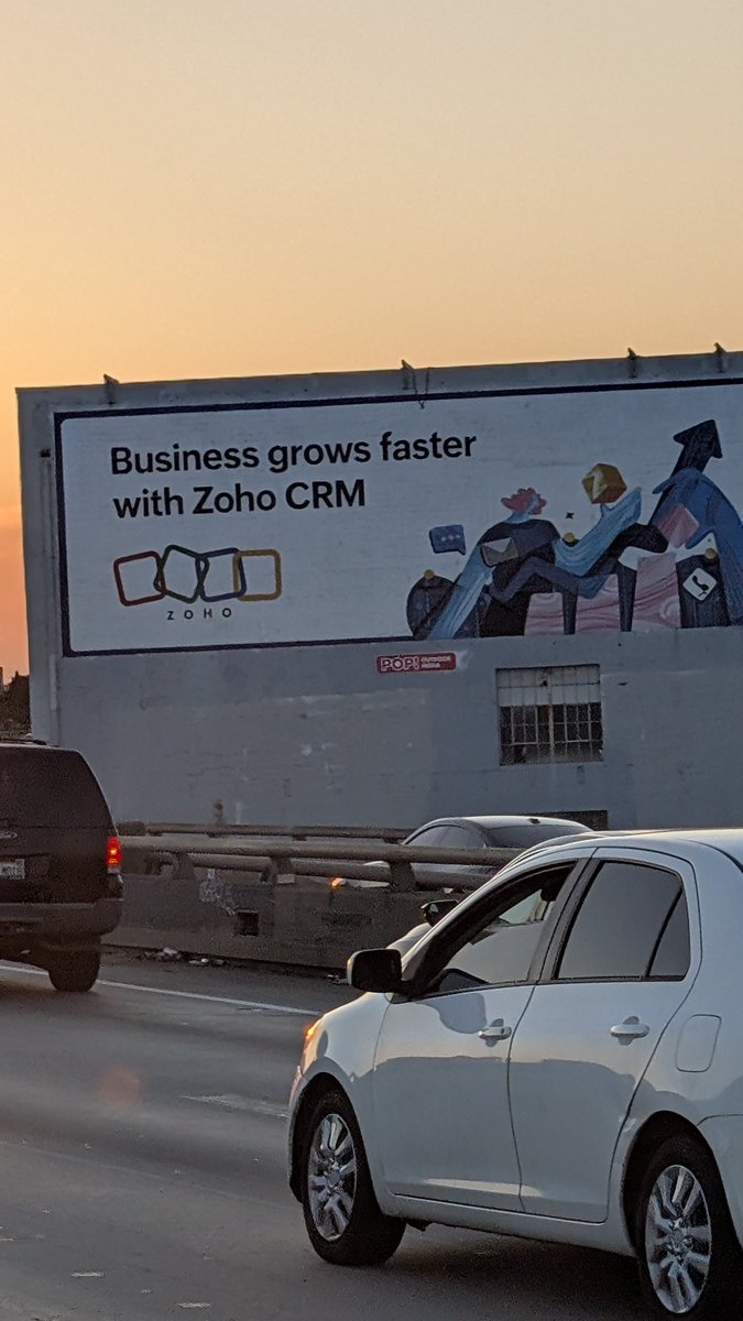 Naa_Two's tweet photo. Spotted this driving down the I-10 in Los Angeles. Didn't expect this. You guys aren't just trending on X. Way to go! @svembu @Zoho https://t.co/ss4gnboKEo