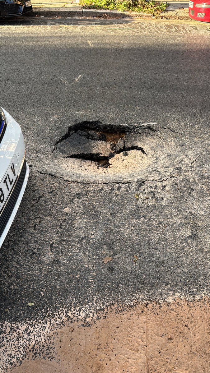 RLBailey's tweet photo. @CamdenCouncil your phone lines do not work but this is a hole in Westbere Road you might want to fix it before a vehicle is damaged. https://t.co/ctjKJUCCsY