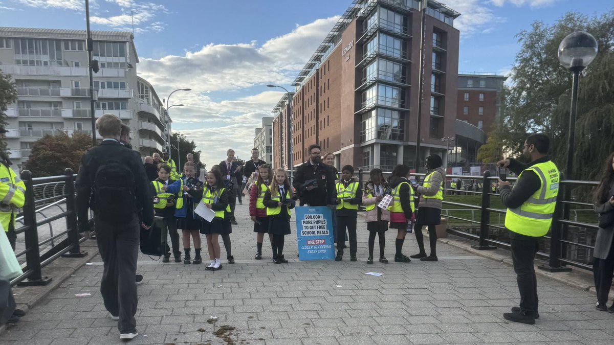 More than slightly odd to see dozens and dozens of schoolchildren outside of the Labour Conference, ‘campaigning’ for free school meals. During school time.

I ask one of their guardians where have they come from, he tells me it has been organised by local schools in Liverpool.