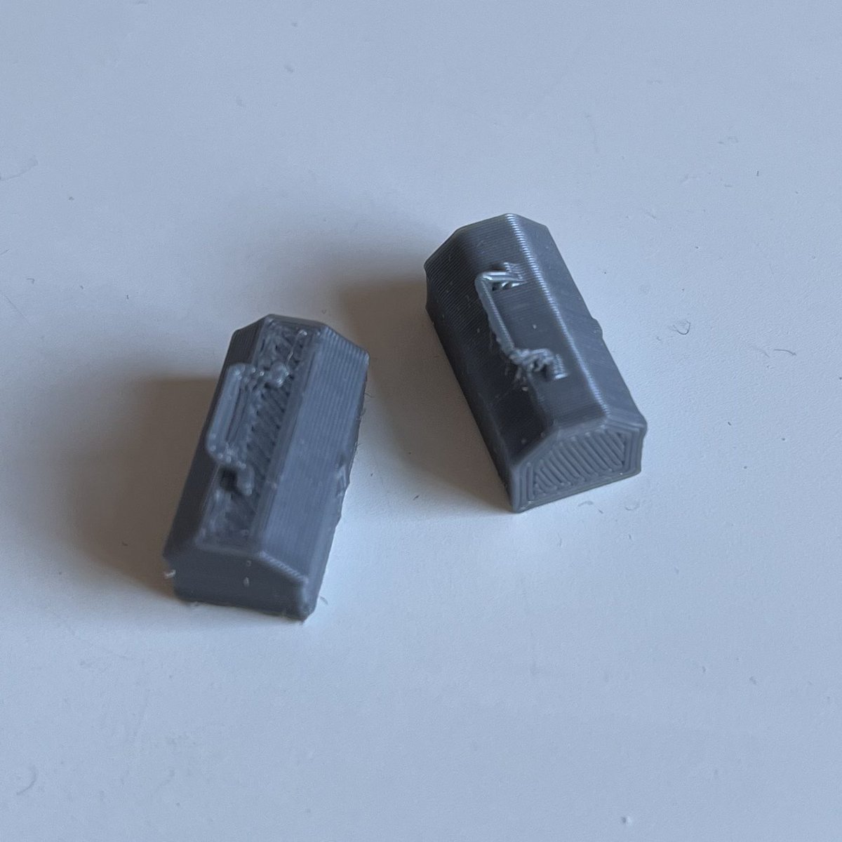 Printing my new toolkit design end-on (right) helps prevent the stepping of the sloping sides when printed conveniently (left). Ends will also be easier to clean up. Exactly the same .stl file, just sliced differently.
