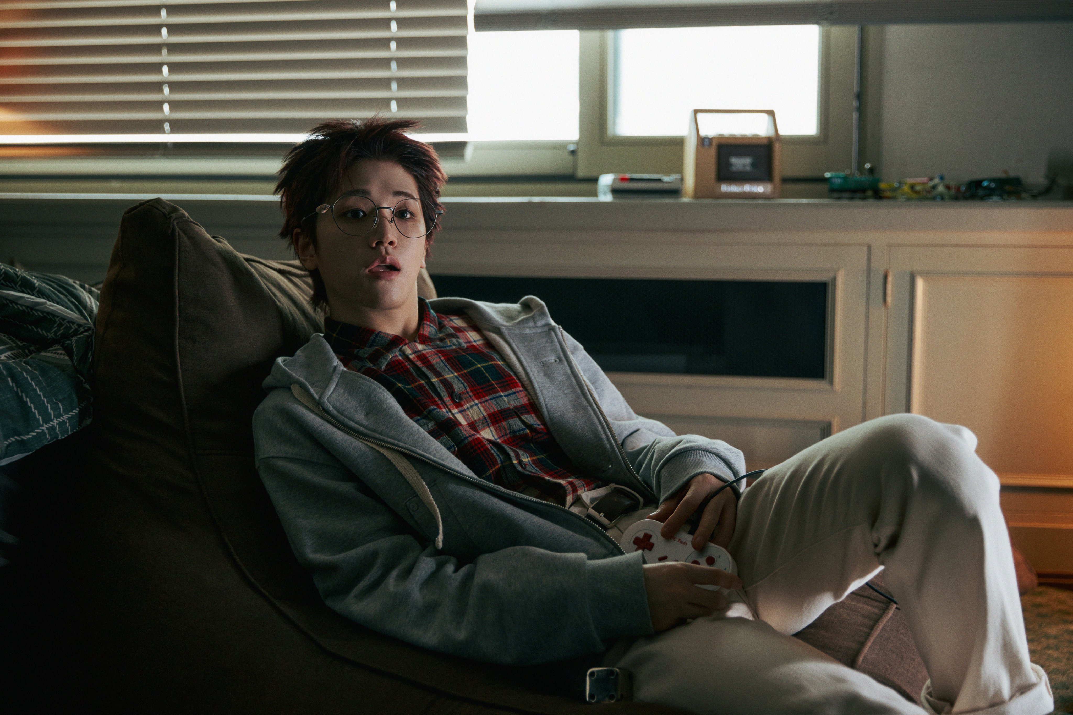 Riwoo of BOYNEXTDOOR dancing gracefully, showing his expressive moves and soft visuals.