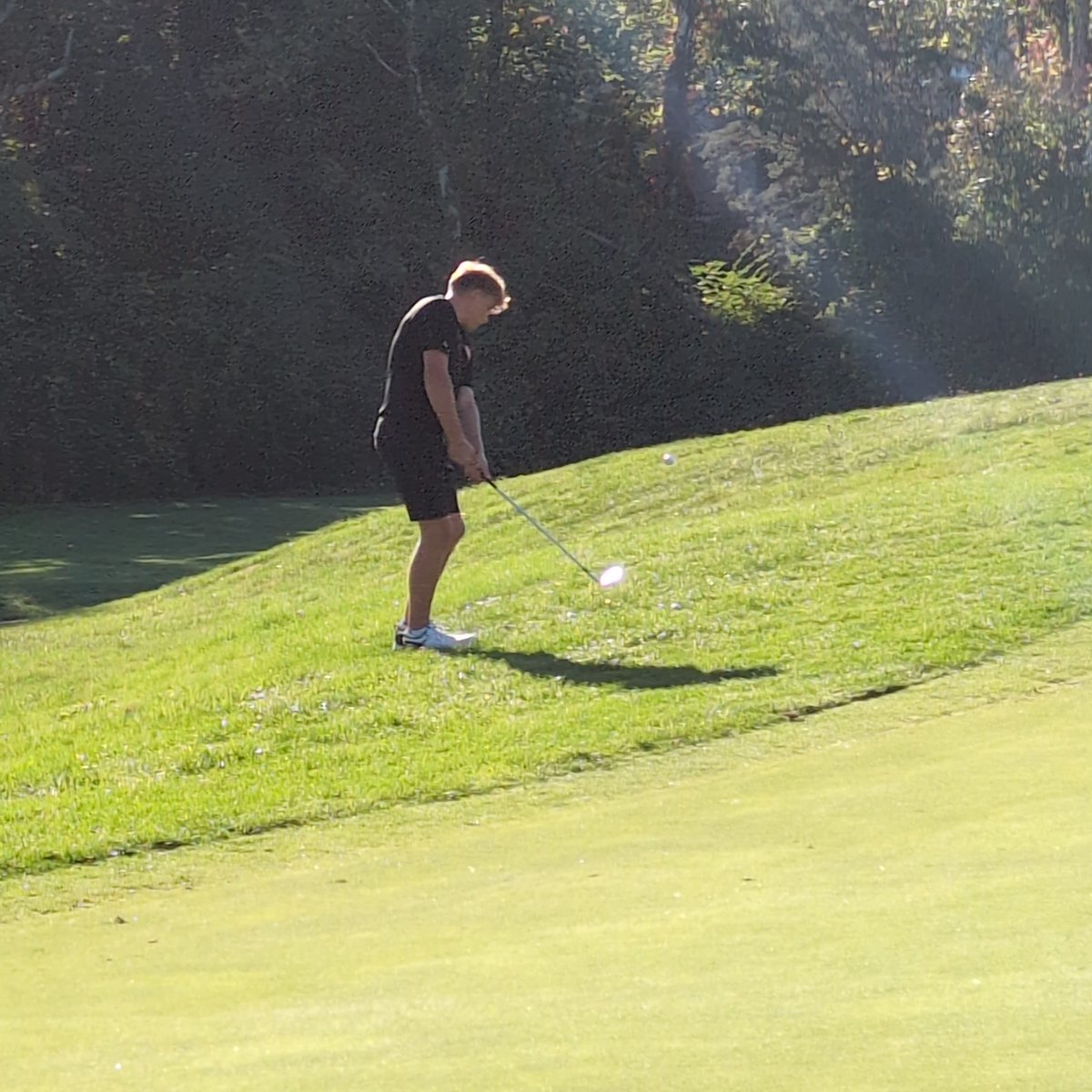 Gunnar getting warmed up for his District Golf Match today. Good Luck kid