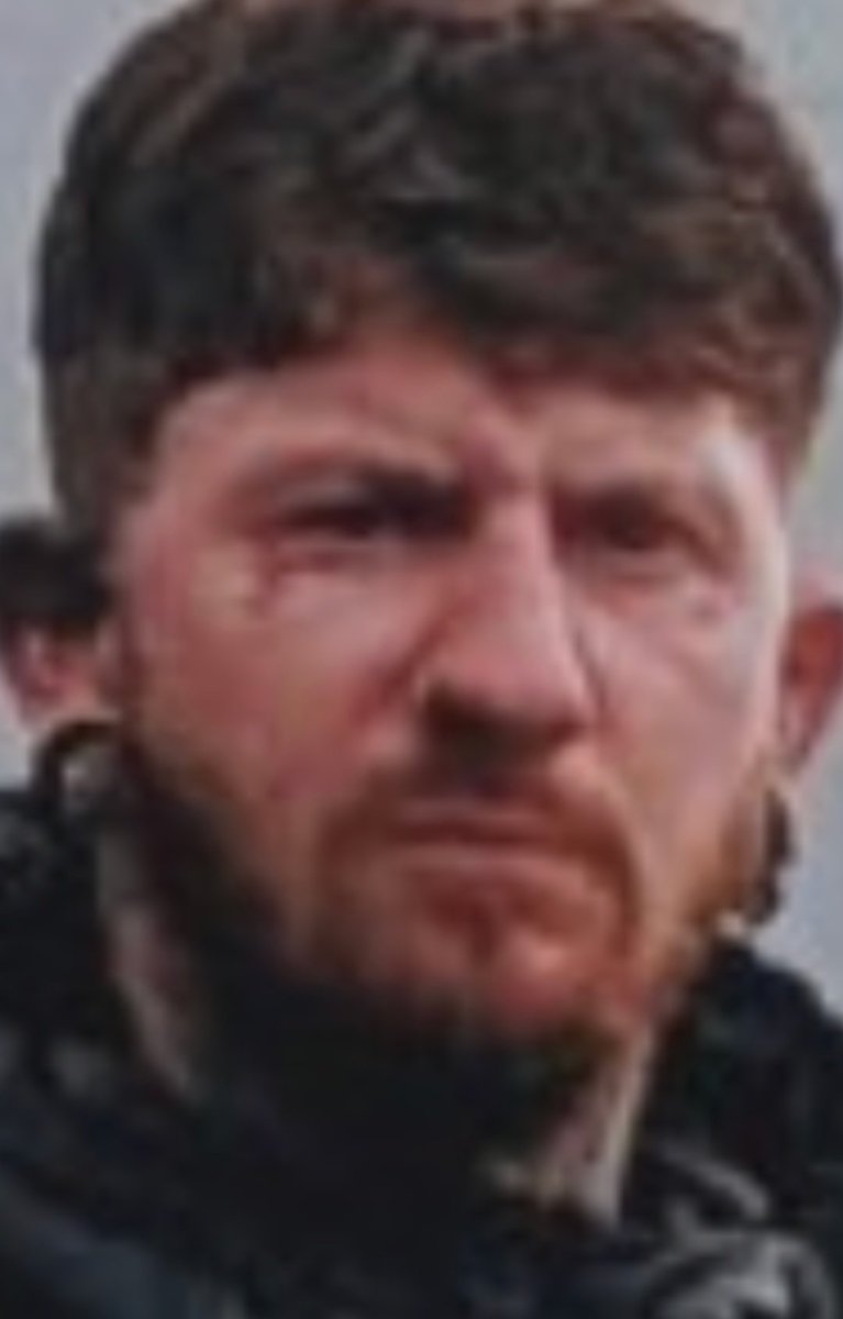 I do not look happy about the weather, but trust me - I am having the best time