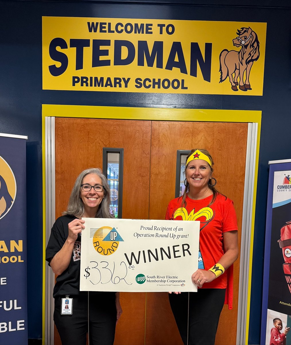 Stedman Primary School students will be learning more interactively with a Clear Touch Interactive Panel purchased with a grant through Operation Round Up. Pictured: Principal Heidi Hudson and Media Coordinator Shannon Dawkins.