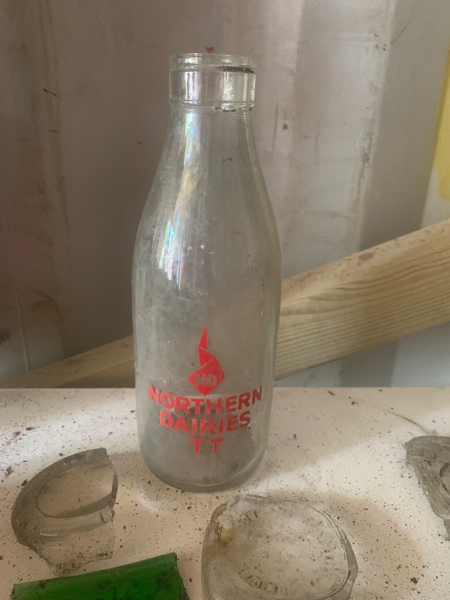 NPTHull's tweet image. A glimpse into the interior of the National Picture Theatre revealed during excavation works! Highly decorative tiles, gas lamp wall brackets and local dairy milk bottles build a picture of life during the period. More can be discovered once restoration works are complete!