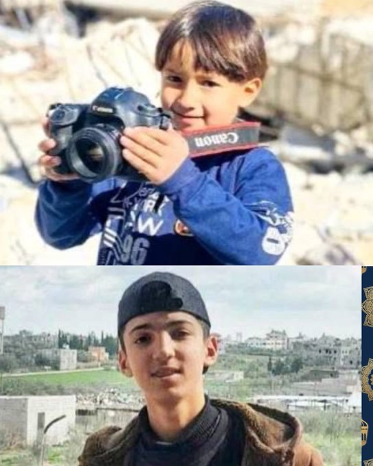 A young boy, Abdullah Atef Abu Labda, holding a Canon camera, wearing a blue long-sleeve shirt with text and a red strap. An older boy, also Abdullah Atef Abu Labda, wearing a black cap and jacket, standing outdoors with buildings and a partly cloudy sky in the background.