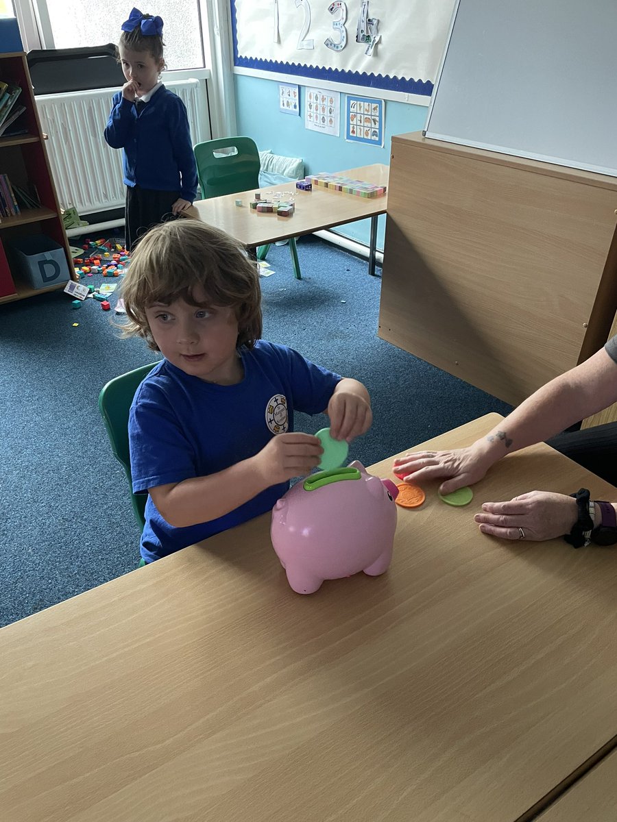 P1_2aSMOS's tweet photo. Learning to take turns with a friend or grown up today! We loved doing a bit of posting coins, this helped us work on our fine motor skills too. 🐷 @SMOSPrimary https://t.co/NXsECQB8nr