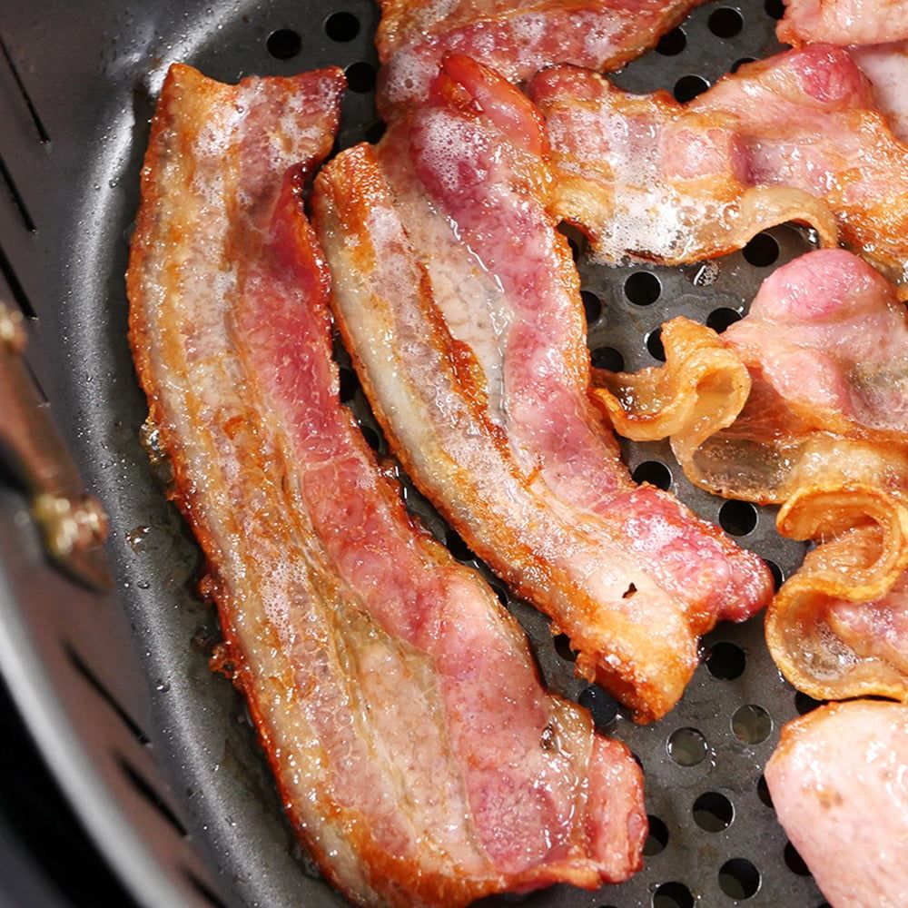 cookingperfect's tweet photo. Cooking bacon in an air fryer is quicker, cleaner, and frees up stovetop space. Enjoy crisp, tasty bacon in minutes! Perfect for burgers, French toast, and breakfast muffins. https://t.co/Khpe7dfKrL https://t.co/M8p7dY8NCj