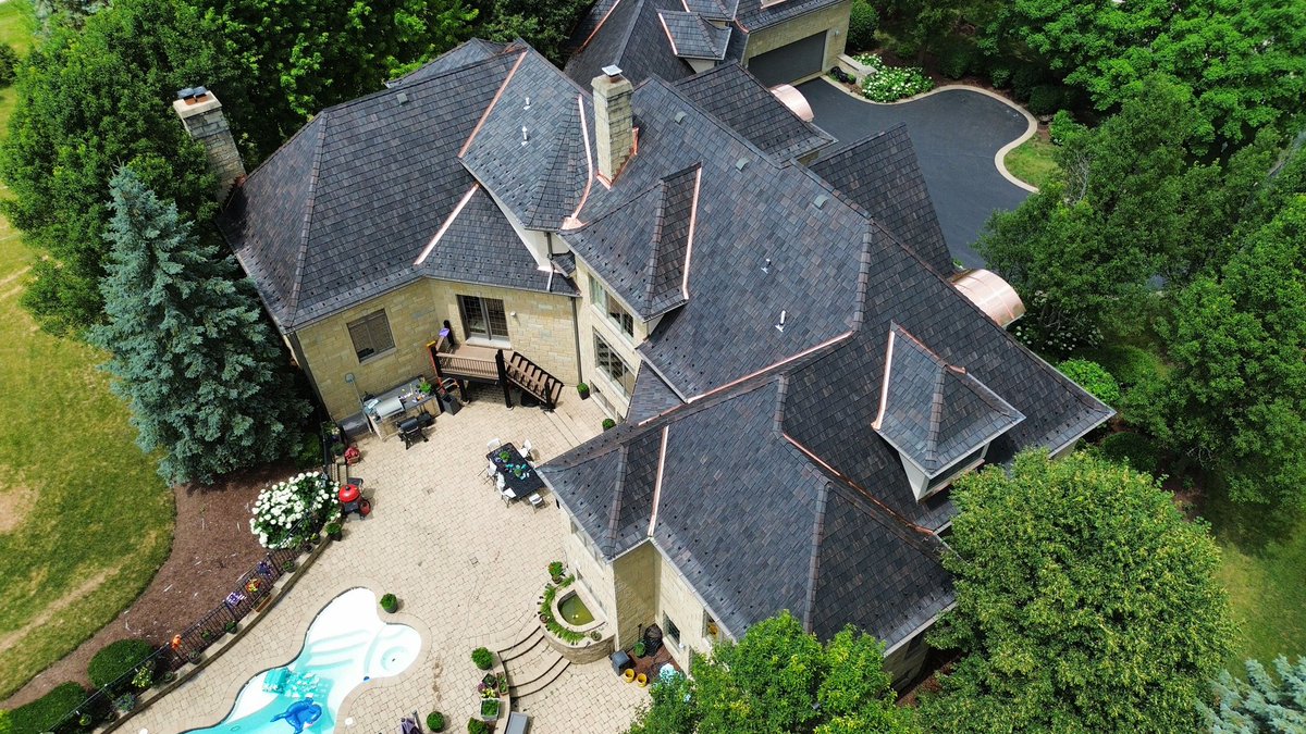 The Roof on this beautiful Lake Barrington home was originally Real Cedar, however, the owner was ready for a change, so the Shake Guys Team removed the Cedar Shakes and installed a new Brava Composite Cedar Shake Roofing System! 

Learn More>> shakeguys.com/product/brava/
