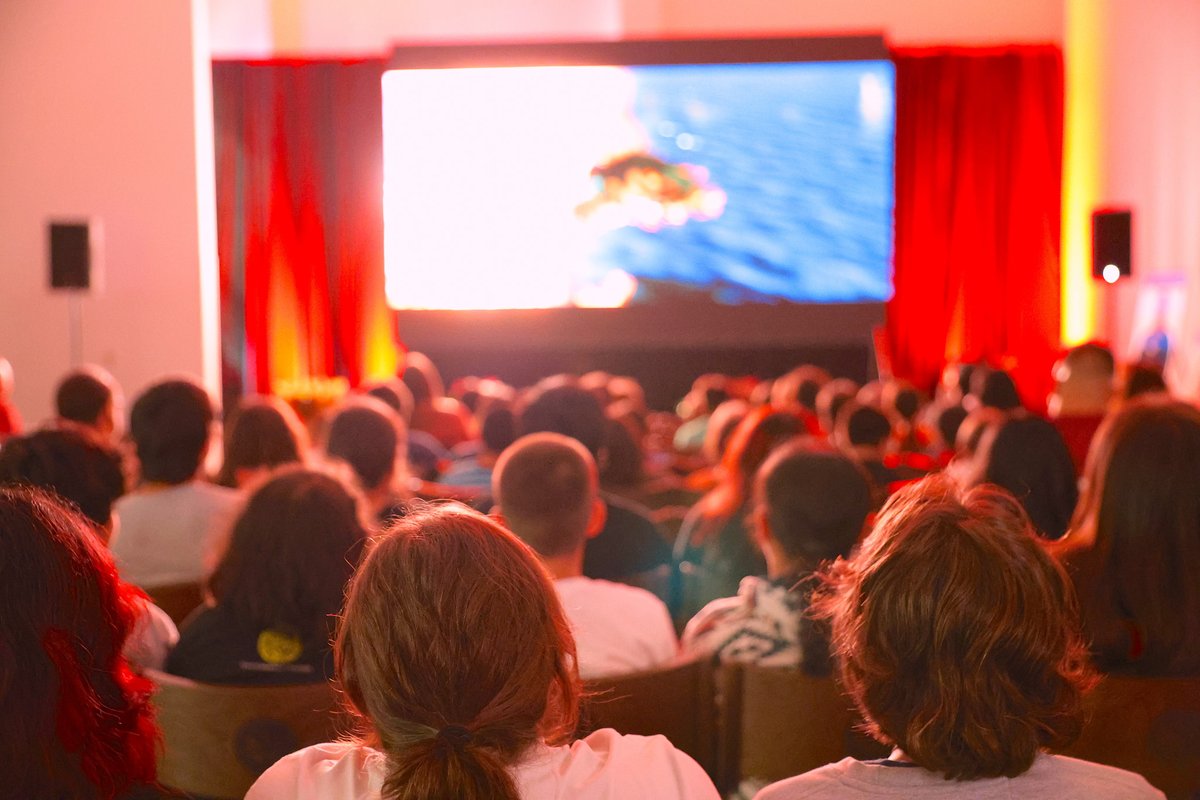 CherokeeNation's tweet photo. The Cherokee-dubbed version of "How to Train Your Dragon”  made its debut at the Durbin Feeling Language Center in Tahlequah! Cherokee Nation leaders, voice actors, translators, and CLMAP and Cherokee Immersion school students had their chance to watch it on the big screen. https://t.co/otJY0GEA86
