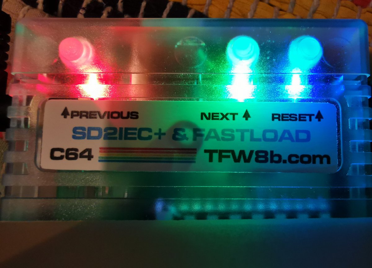 futurewas8bit's tweet photo. Hybrid SD2IEC &amp; FASTLOAD Combo Cartridge now available in a bunch of colours. 😎
https://t.co/82Vvf2A9zL 
#Commodore64 #C64 #RetroComputing #RetroGaming #8bit https://t.co/iJq9CJNdu1