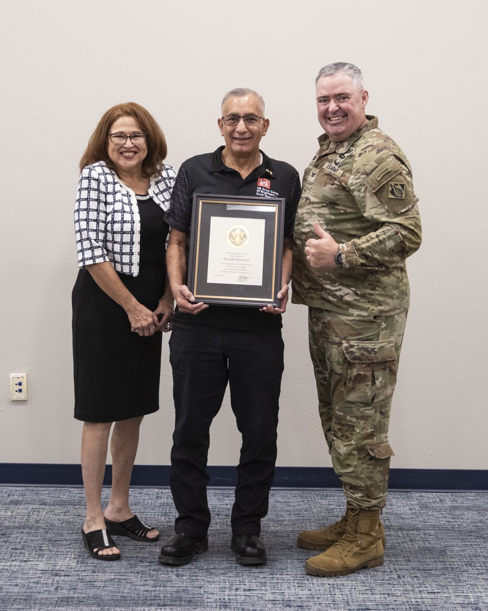 Col. Calvin Kroeger, Fort Worth District commander, and district co-workers honor Ricardo Martinez for his 50 years of federal service at the South Texas Area Office in San Antonio, Texas, on Sept. 23, 2025.
