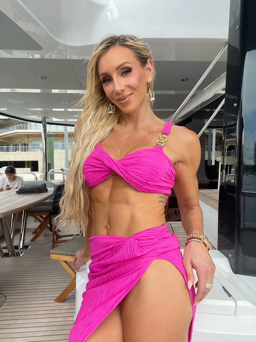 WrestlingStyleX's tweet image. Charlotte Flair pretty in pink