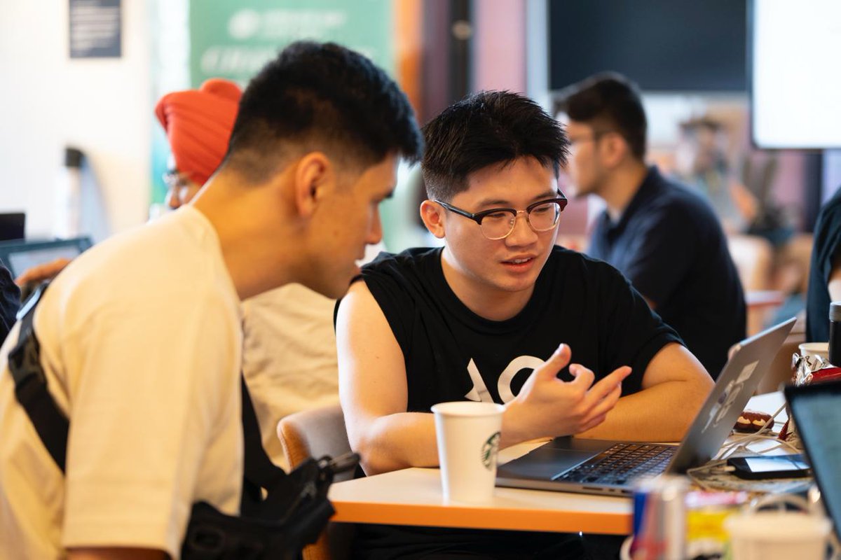 aoTheComputer's tweet photo. After intros, the Champions are hard at work! 🏗️

They’re adding new features and refining their Hackathon-winning projects — collaboration in action, ideas taking shape. 

If you could collaborate with these hackers, what would you build? https://t.co/VBEpGuOdYC