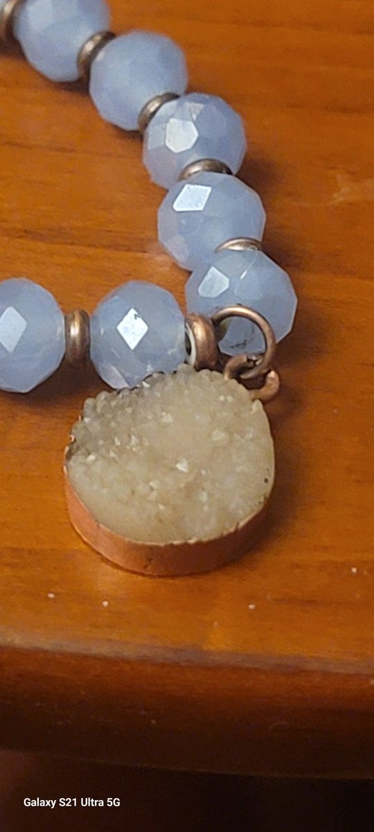 Close up of a bracelet pendant