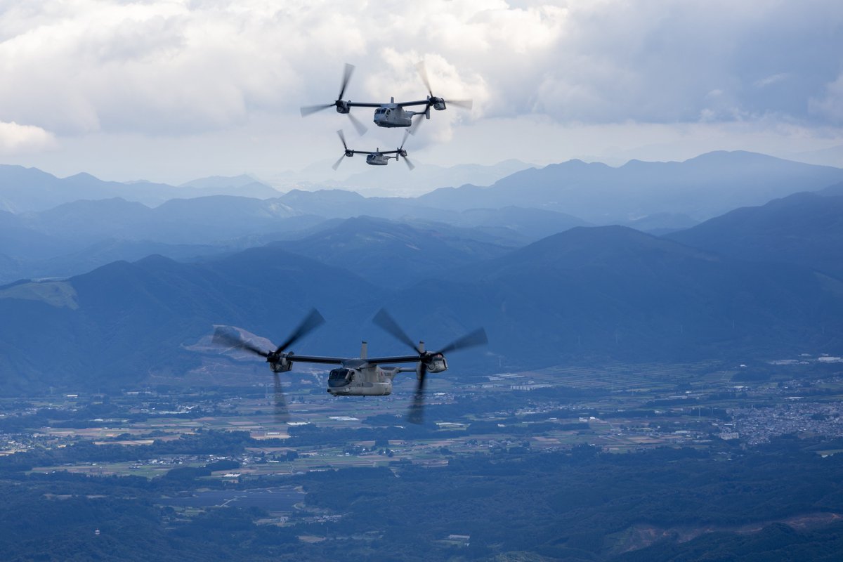 1stMAW_Marines's tweet photo. A U.S. #Marine Corps MV-22B Osprey with Marine Medium Tiltrotor Squadron 262 flies in formation with #V22 Ospreys from the Japan Ground Self-Defense Force during exercise #ResoluteDragon25 over Kagoshima Prefecture, Japan, Sept. 18, 2025. https://t.co/sH7eupS6oF