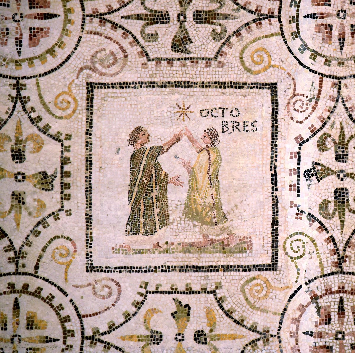 Happy October!

📷 October from the Mosaic with the months of the year from Thysdrus (El Jem). This panel depicts two men facing one another and pointing to a star. According to one theory, it celebrates the birthday of Alexander Severus on October 1 AD 208. It depicts the
